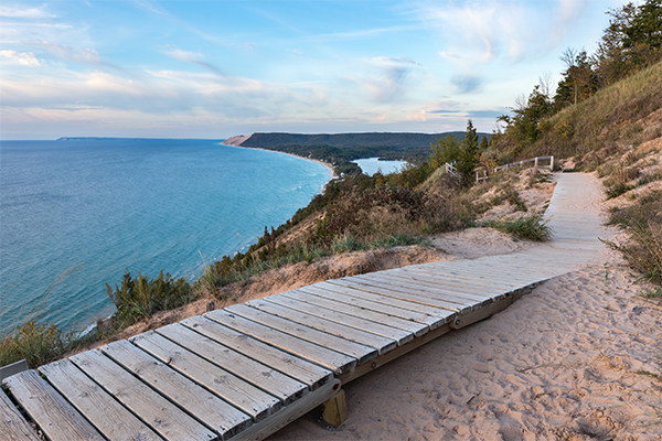 landscape view of a lake with boardwalk trail