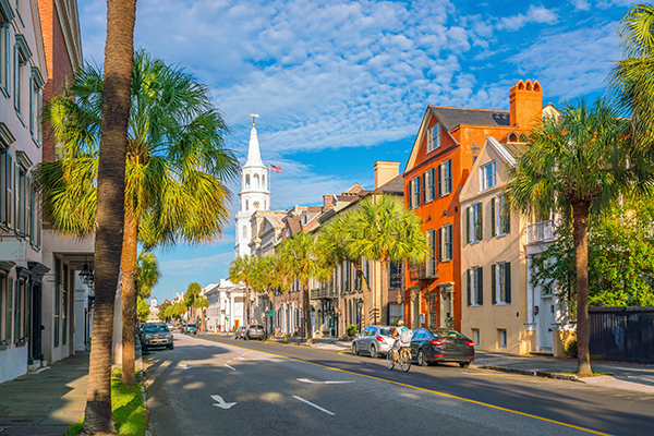 Historic houses downtown Charleston with palm trees