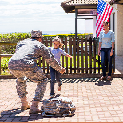 Military Dad arriving home to his daughter and wife in driveway