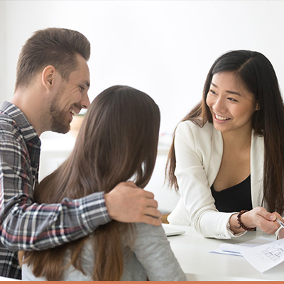 Young couple meeting with realtor