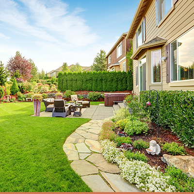 Landscaped patio area in backyard