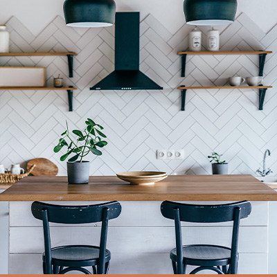 Small renovated kitchen with black hardware