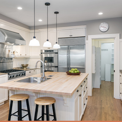 Clean updated kitchen with tasteful decor on the counter