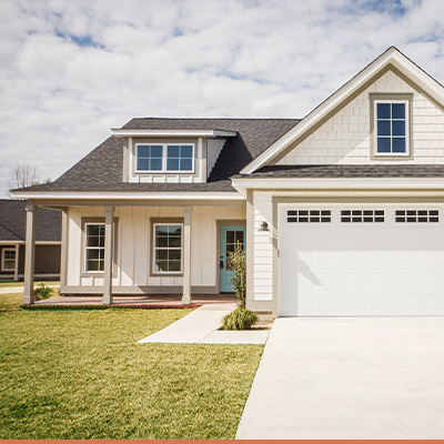 Exterior of house with well maintained yard and fresh coat of paint