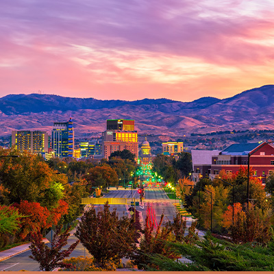 Sunset aerial view of Boise, Idaho with mountains in the background